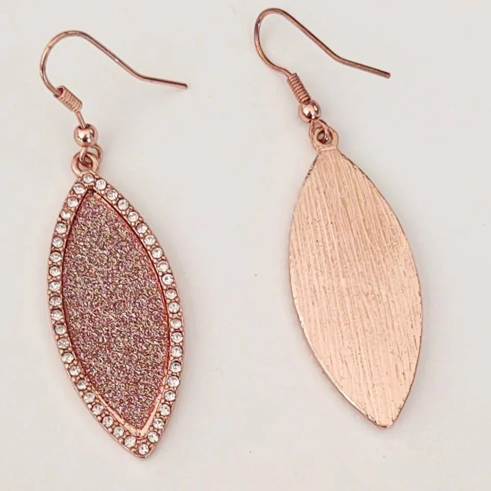 Sparkly rose gold dangle earrings with cz accents